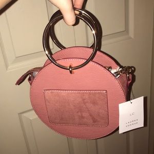 Lauren Conrad circular rose/gold purse